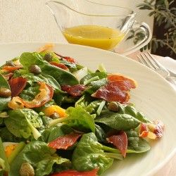 Orange Maple Bacon Vinaigrette Over Wilted Baby Spinach