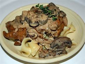 Chicken, Caramelized Onions, and Wild Mushrooms Over Pappardelle Sauced With A Creamy Bacon-Thyme-Ba